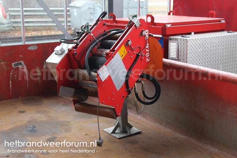 06-9782 Slangen opneem Apparaat